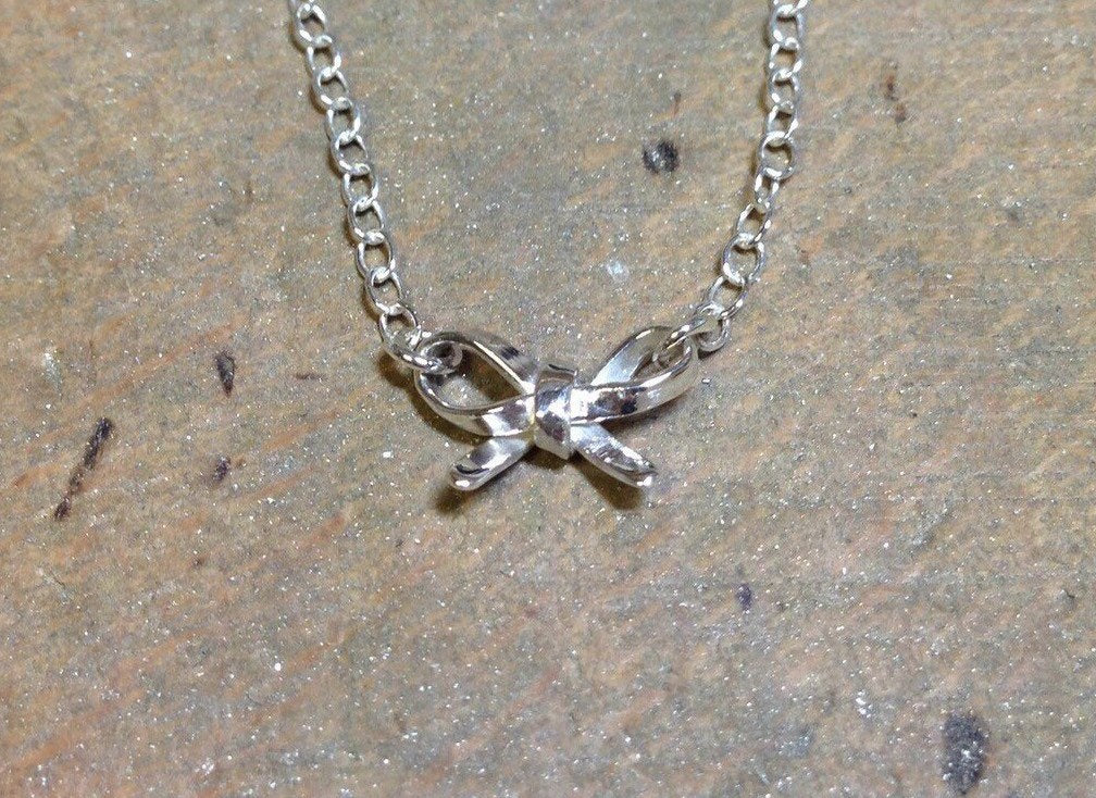 Sterling silver bow necklace